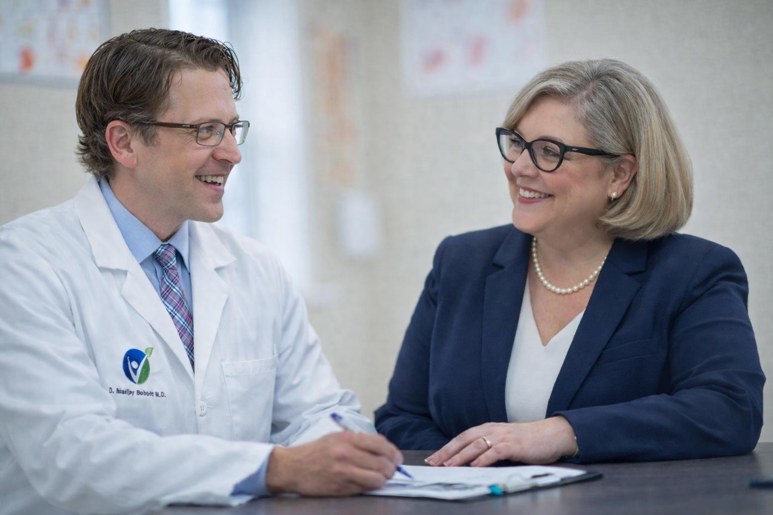 BHRT near me – SottoPelle method explained – Doctor Consulting With Patient During a Friendly Medical Appointment