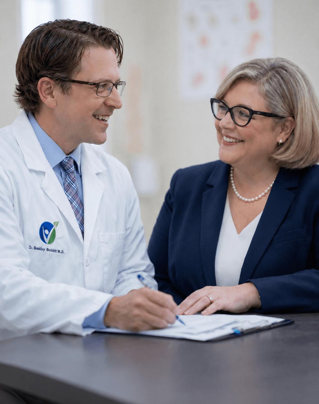 Doctor and patient in consultation discussing hormone therapy options — personalized BHRT Cincinnati Vigour